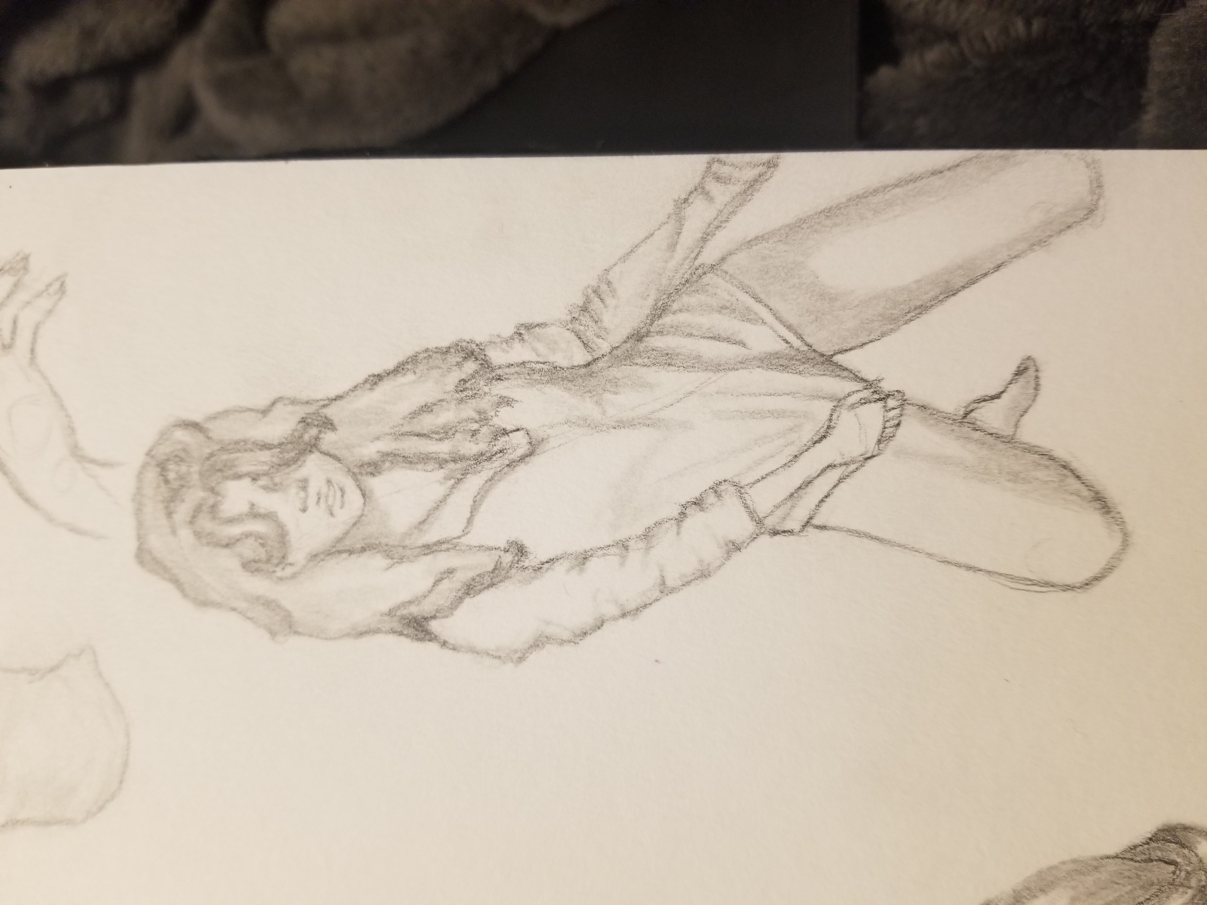 Graphite figure study of a person standing and pulling down the hem of their shirt